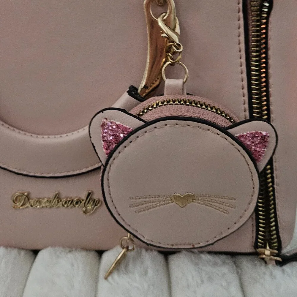Danbaoly Pink handbag w/handles and crossbody strap NWOT